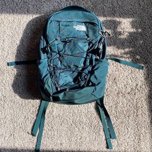 The North Face forest green hiking backpack